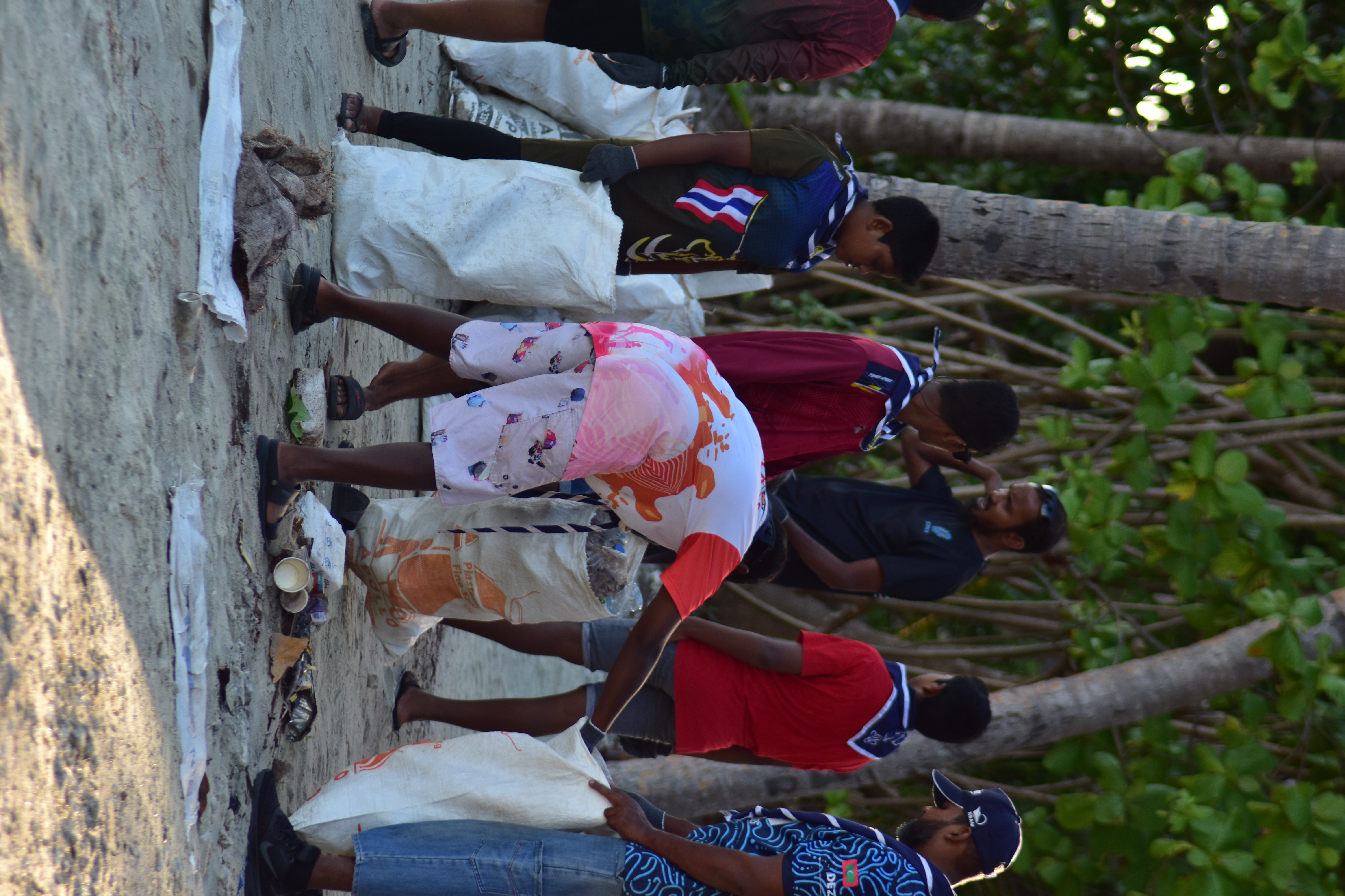 Scouts and volunteers collecting waste during the beach clean-up