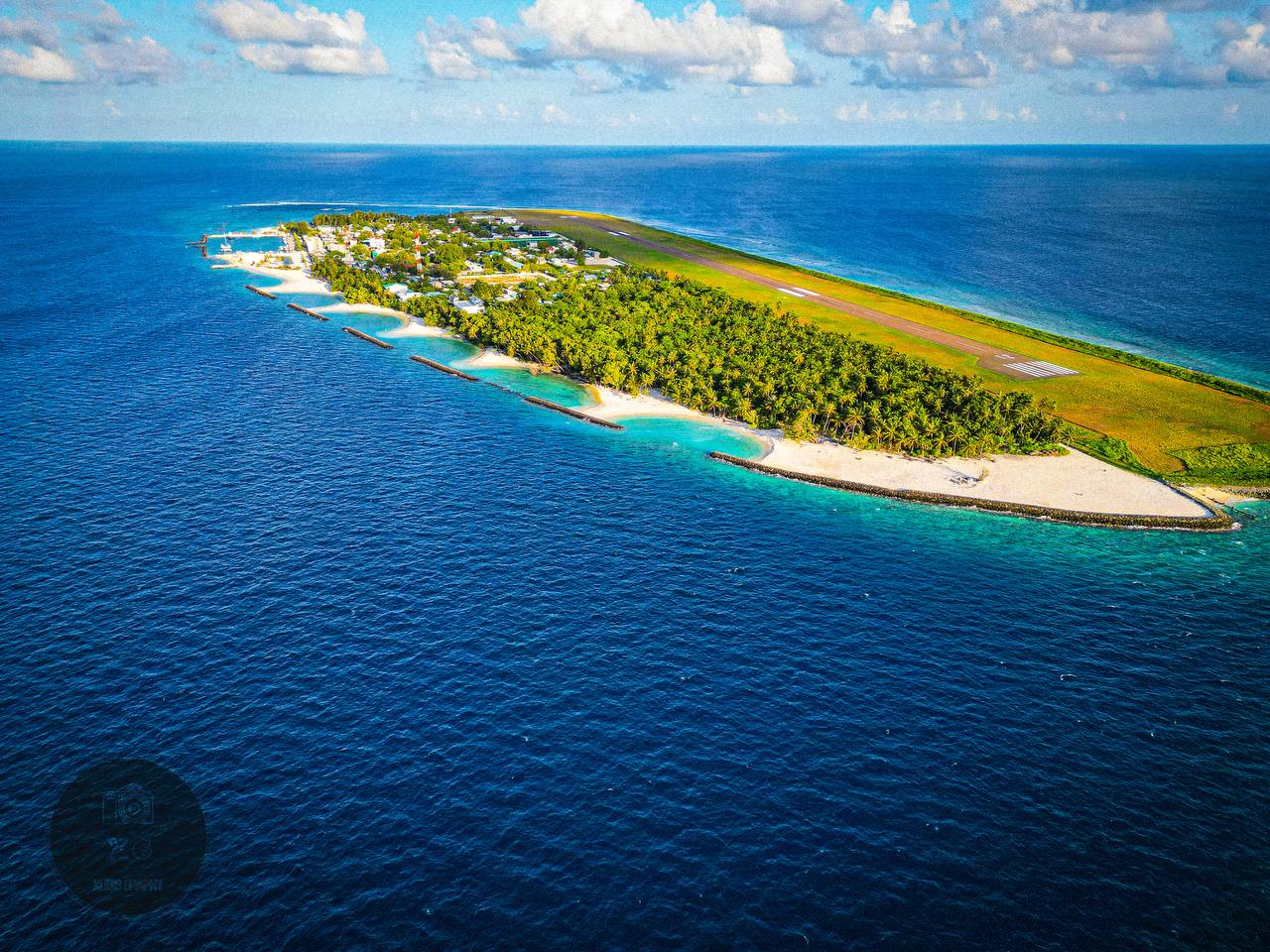 Aerial view of Dharavandhoo island and its surrounding reef